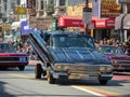 Man demonstrating his hydraulic low rider at the Carnaval Grand Royalty Free Stock Photo
